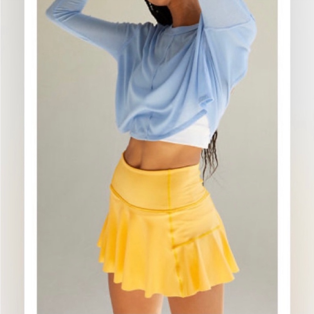 FP Movement Women's Check Out My Topspin Skort mango color size L